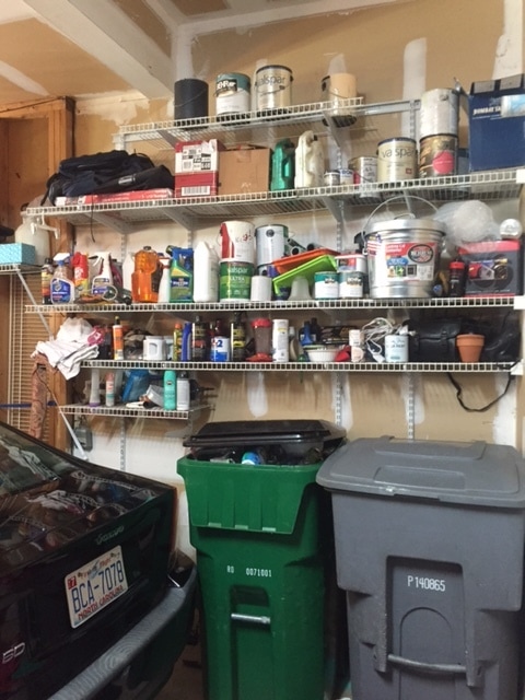 https://www.sageorganizingco.com/uploads/7/3/4/4/73445555/cluttered-garage-with-paint-car-care-and-tools_orig.jpg